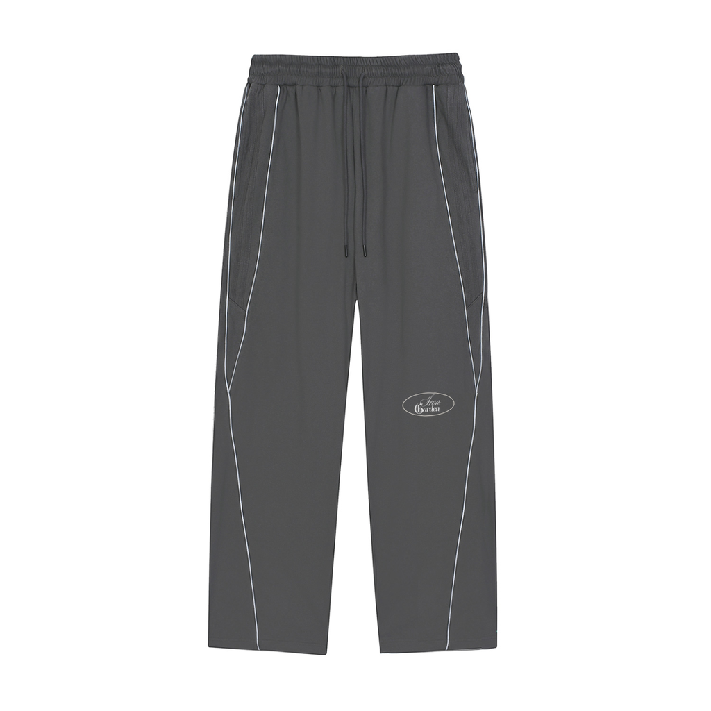 "LIGHT OF THE WORLD" REFLECTIVE OVERSIZED TRACK PANTS