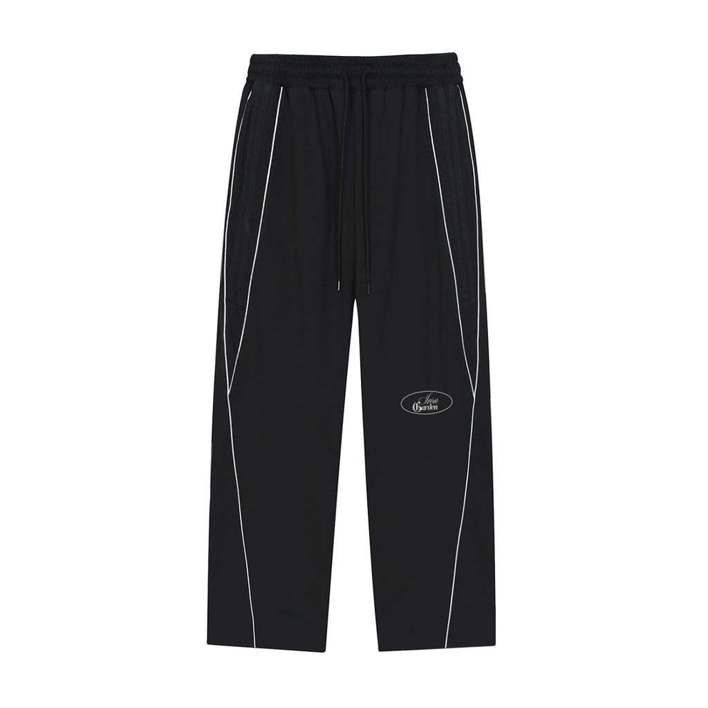 "LIGHT OF THE WORLD" REFLECTIVE OVERSIZED TRACK PANTS